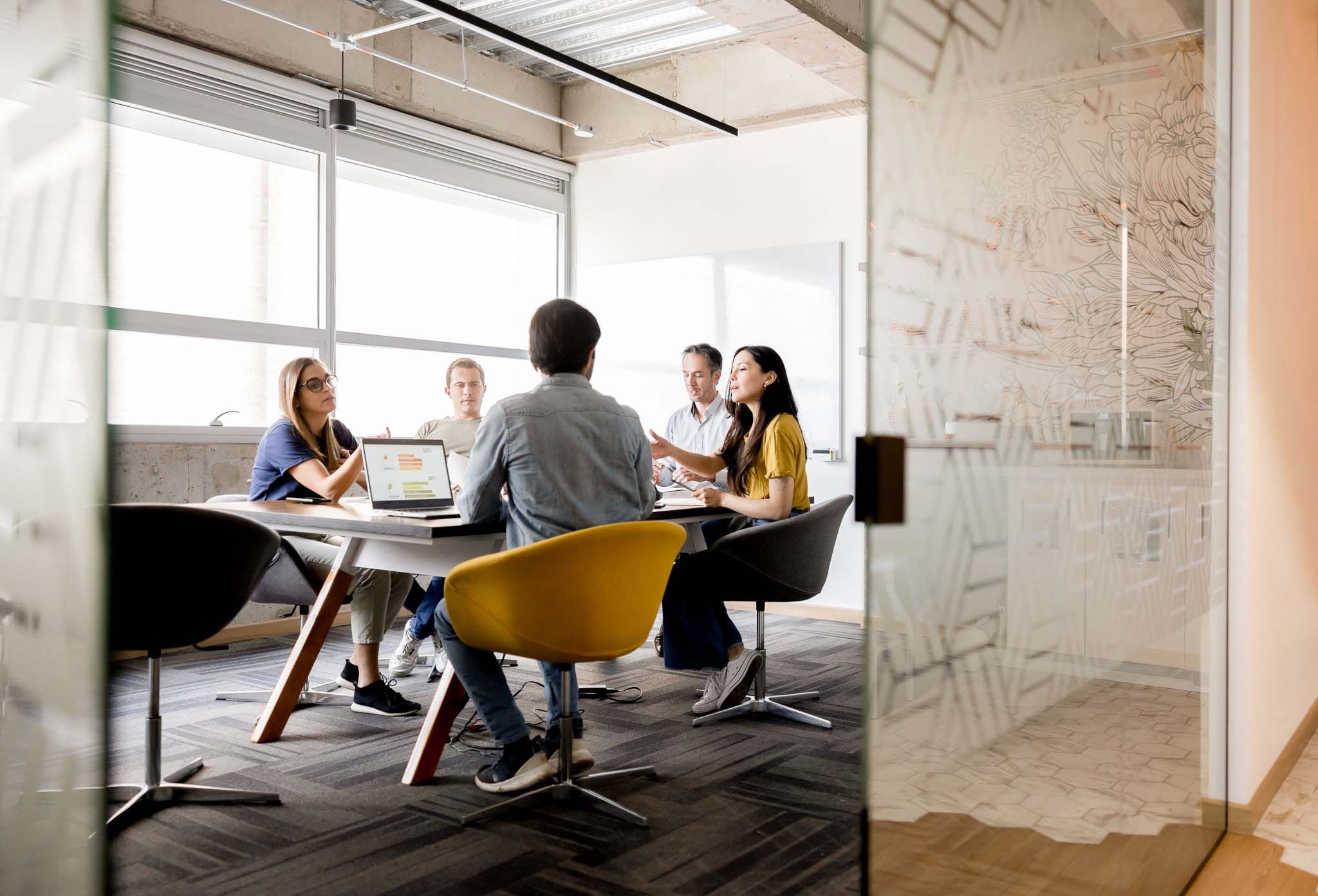 Group of business people talking in a meeting at the office