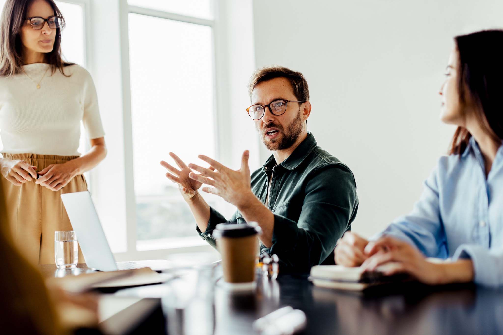 Business man discussing with his team in an office